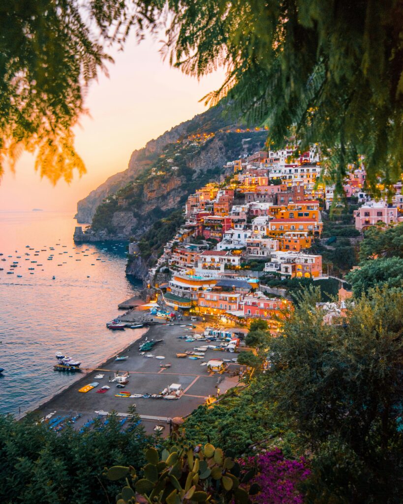 pexels photo 3225528 3225528 Breathtaking view of Positano's colorful cliffside homes at sunset.